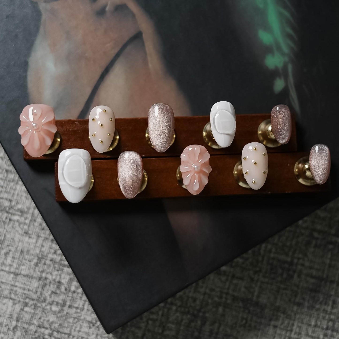 Tesytto Nude Pink Press on Nails Short Almond Cat Eye Fake Nails with 3D Sleek Water Drop Design Glossy Finish Glitter Full Cover Acrylic Nails (Ice Flowers,S)