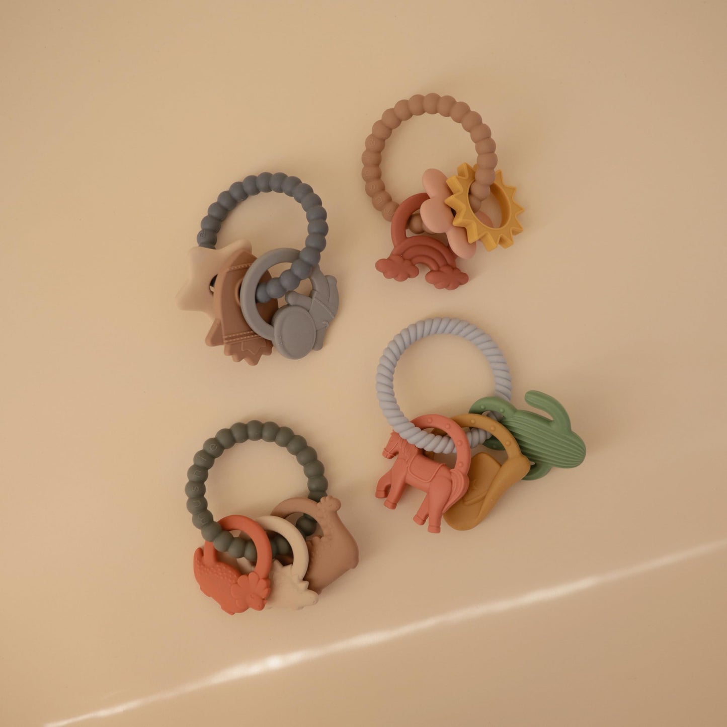 mushie Silicone Dino Teething Ring Toy