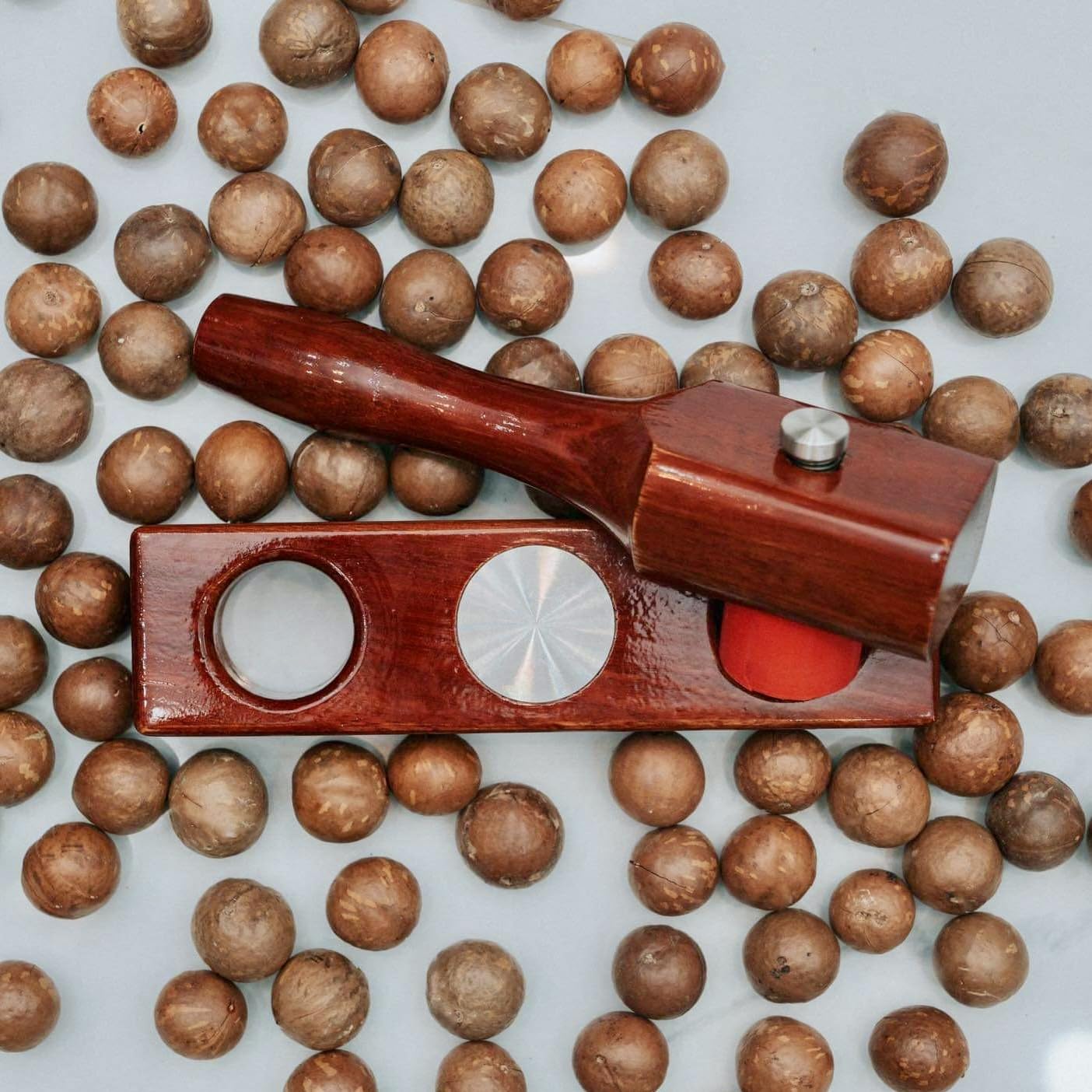 Nut Cracker, kitchen tool - Eat Fresh Cracked Macadamia nuts with your New Maccawakka Nut cracking tool