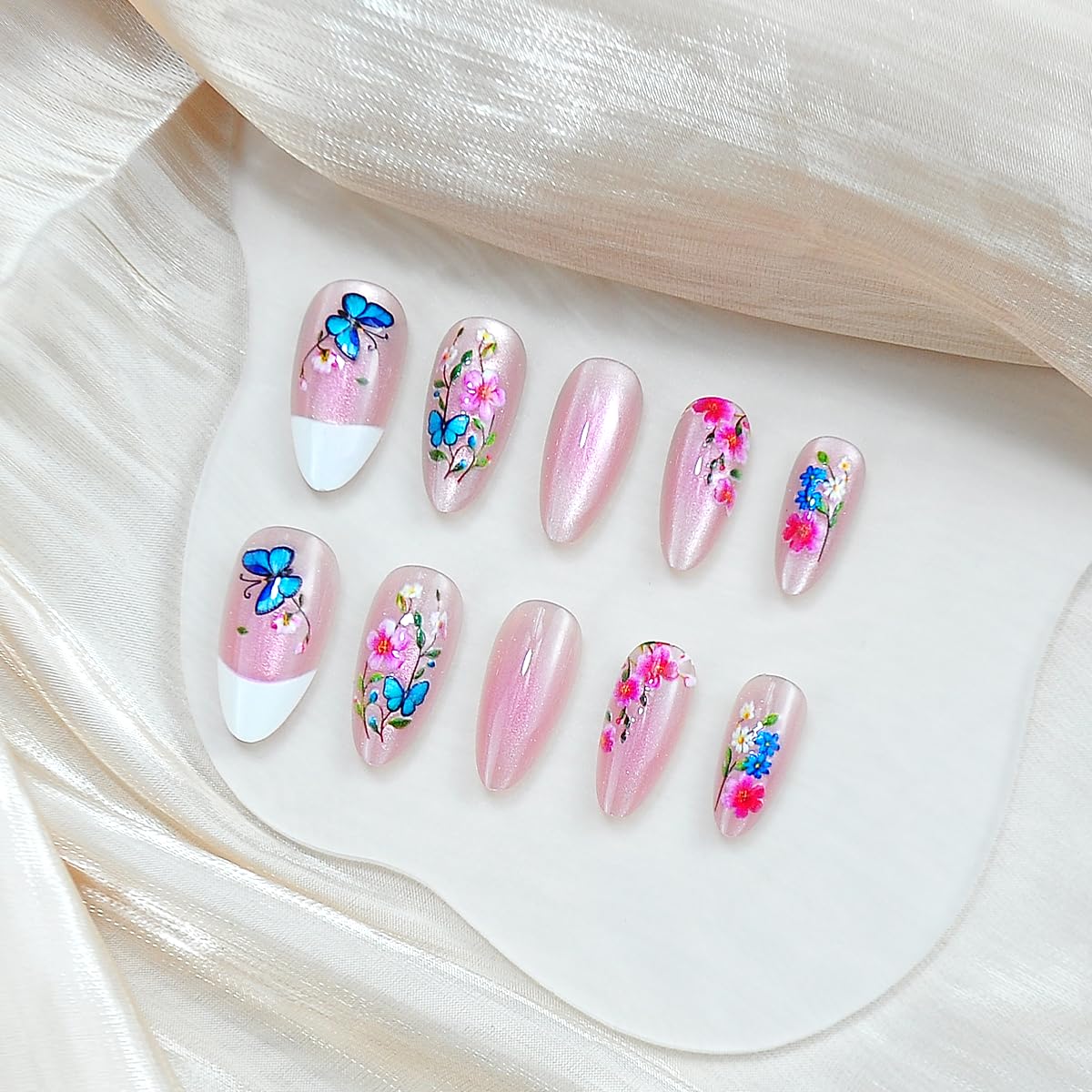 Spring Press on False Nails White French Tip Cat Eye Fake Nails Medium Almond Glue on Nails with Colorful Flower Butterfly Designs Glossy Press ons Stick on Nail for Women Manicure 24Pcs