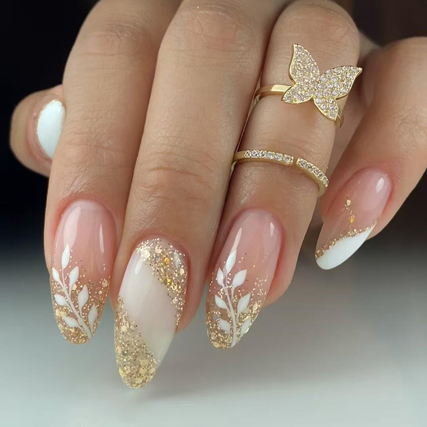 IMSOHOT Press on Nails Almond Medium Fake Nails with White Flower Designs Summer Floral Artificial Glossy Full Cover Golden Glitter Stick on Nails for Women 24Pcs
