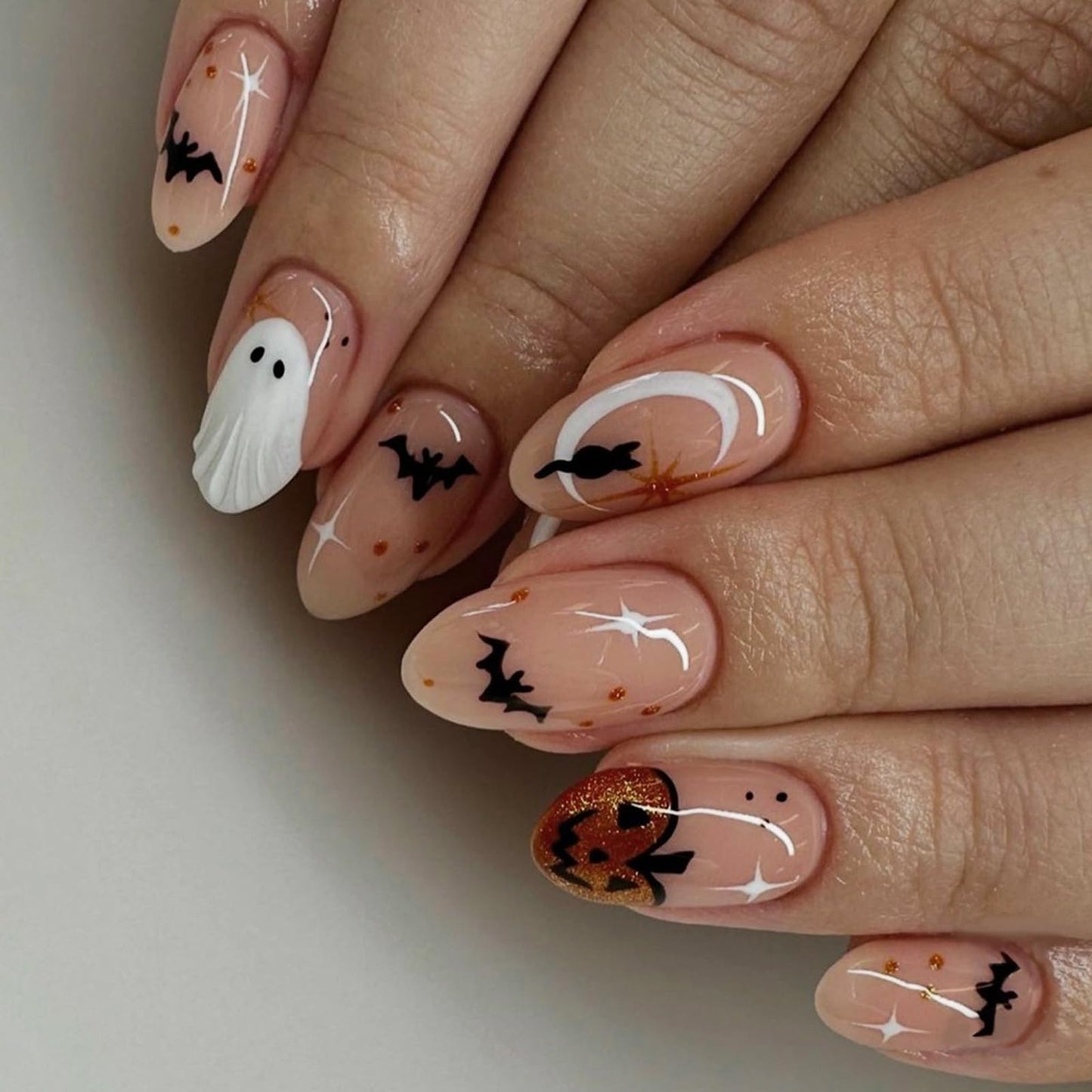 IMSOHOT Halloween Press on Nails - Nude Medium Almond Fake Nails with 3D White Ghost, Orange Glitter Pumpkins, Black Bat Designs | 24 Nail Kit with Glue, Glossy Cute Glue on False Nails