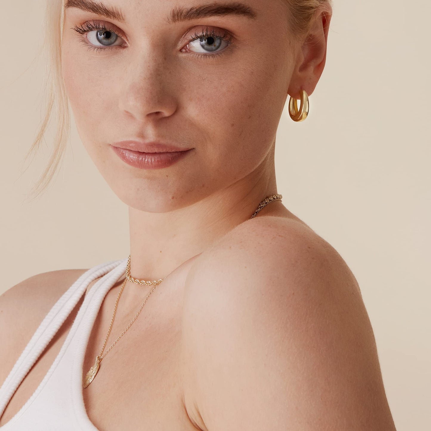 PAVOI 14K Gold Plated 925 Sterling Silver Post Small Chunky Hoop Earrings - Thick Lightweight Gold Hoop Earrings for Women