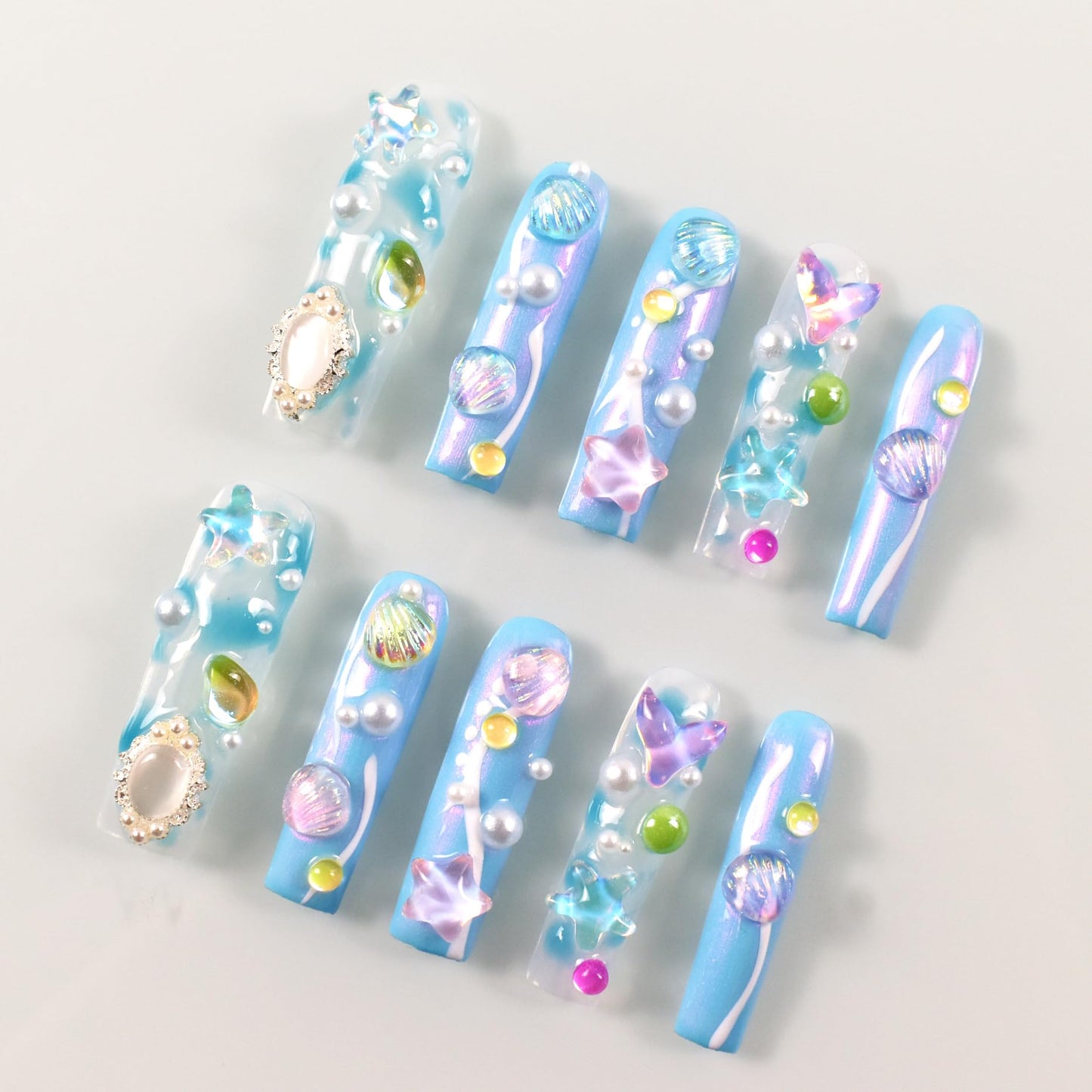 LIFOOST Aurora Blue Handmade Press on Nails Dreamy Ocean Ice Transparent 3D Shell Star Pearls Charms Fake Nails Mermaid False Nails Extra Long Coffin Press ons for Summer, Size M
