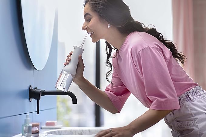 Philips Sonicare Water Flosser Cordless – Rechargeable Power Dental Waterflosser for Teeth, Portable Oral Irrigator with 3 Intensity Settings, 360° Rotating Nozzle – (White)