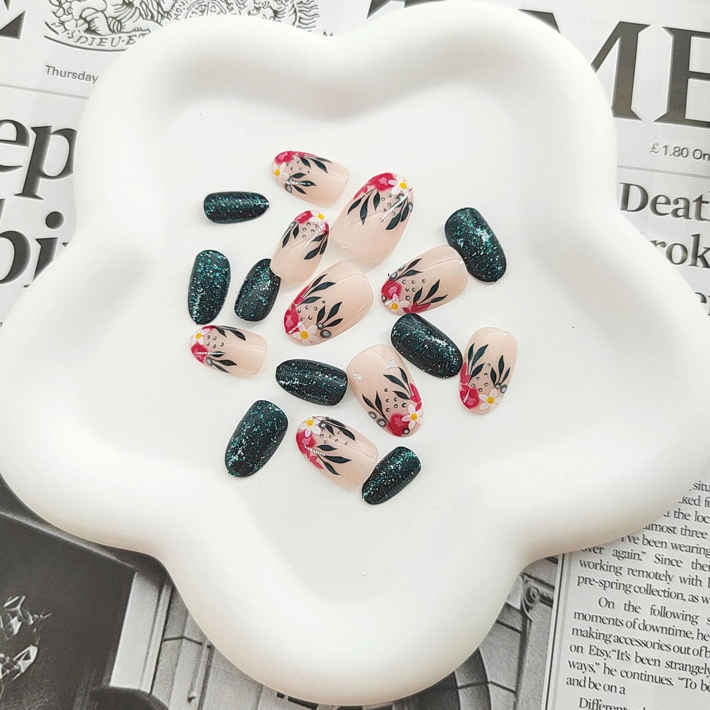 FOLONRAL Short Press on Nails Almond Fake Nails with Floral Patterns Designs Dark Green Glitter Acrylic Nails Nude Full Cover Glue on Nails Glossy Stick on Nails for Women 24 Pcs