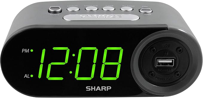Sharp Digital Alarm Clock with 2A USB Charging and Green LED Display | 2A high-speed USB port; Easy-read green LEDs; Simple controls; Phone or tablet charging; Black