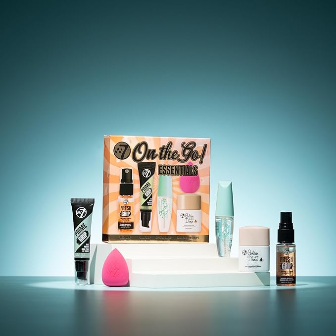 W7 On the Go Essentials Gift Set - Mini Makeup Must-Haves with Primer, Setting Spray, Mascara, Golden Glow Bronzing Drops & Beauty Sponge - Travel or Handbag Size Essentials