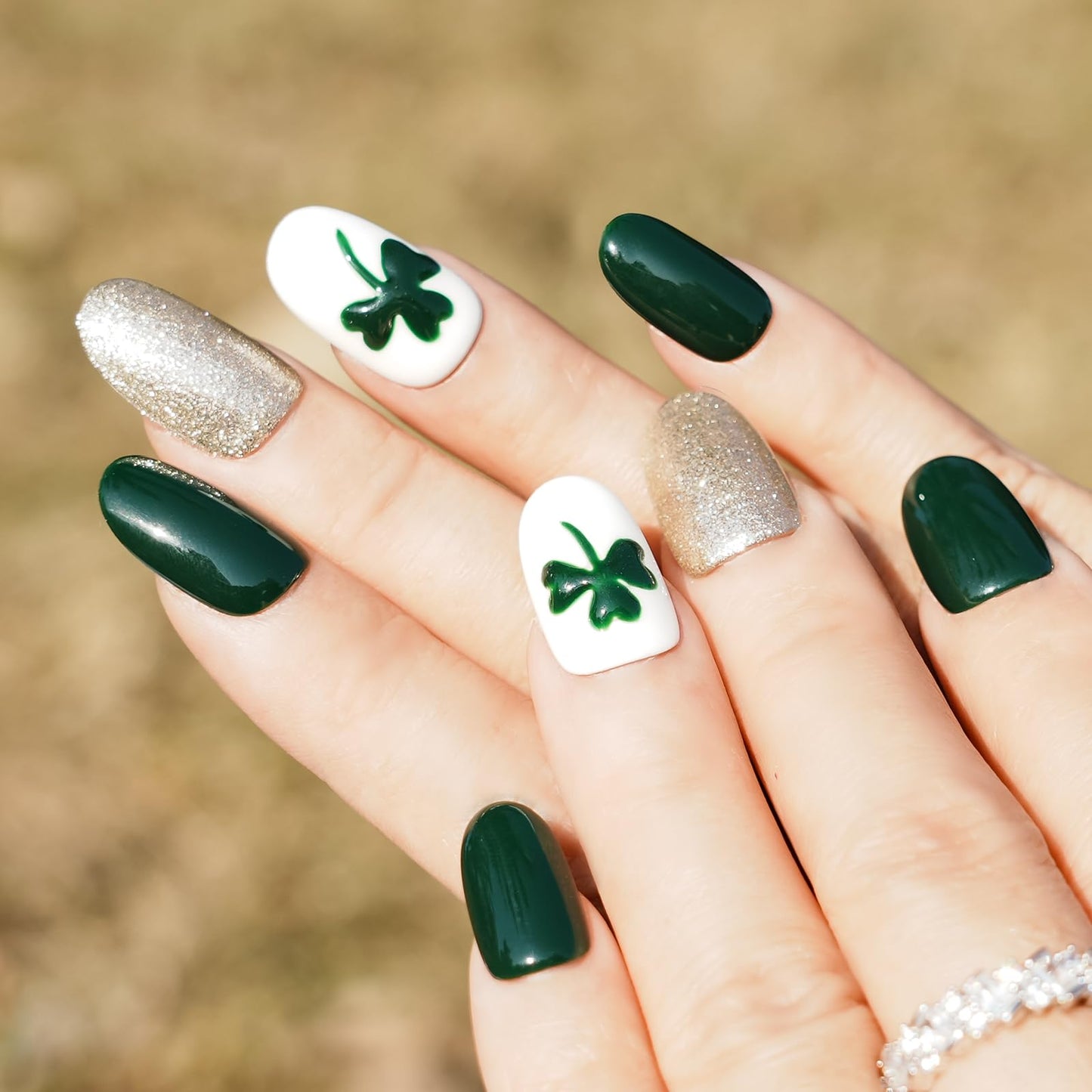 Tesytto Short Oval Press On Nails, Deep Green Silver Glitter Hand-Painted Clover, Reusable Full Cover Acrylic Nail Art (Size M)