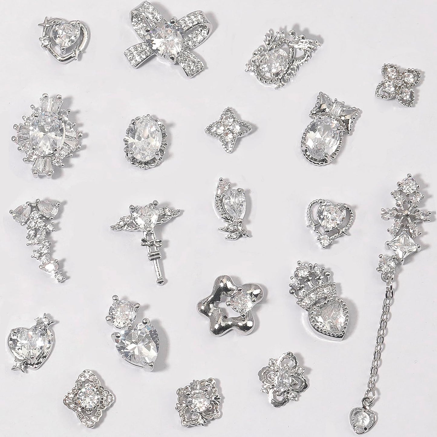 HNUIX Nail Charms and Gems - Silver Copper Zircon, Multiple Shapes 3D Dangle, Metal Luxury Jewelry Rhinestones for Nails 20 Pieces