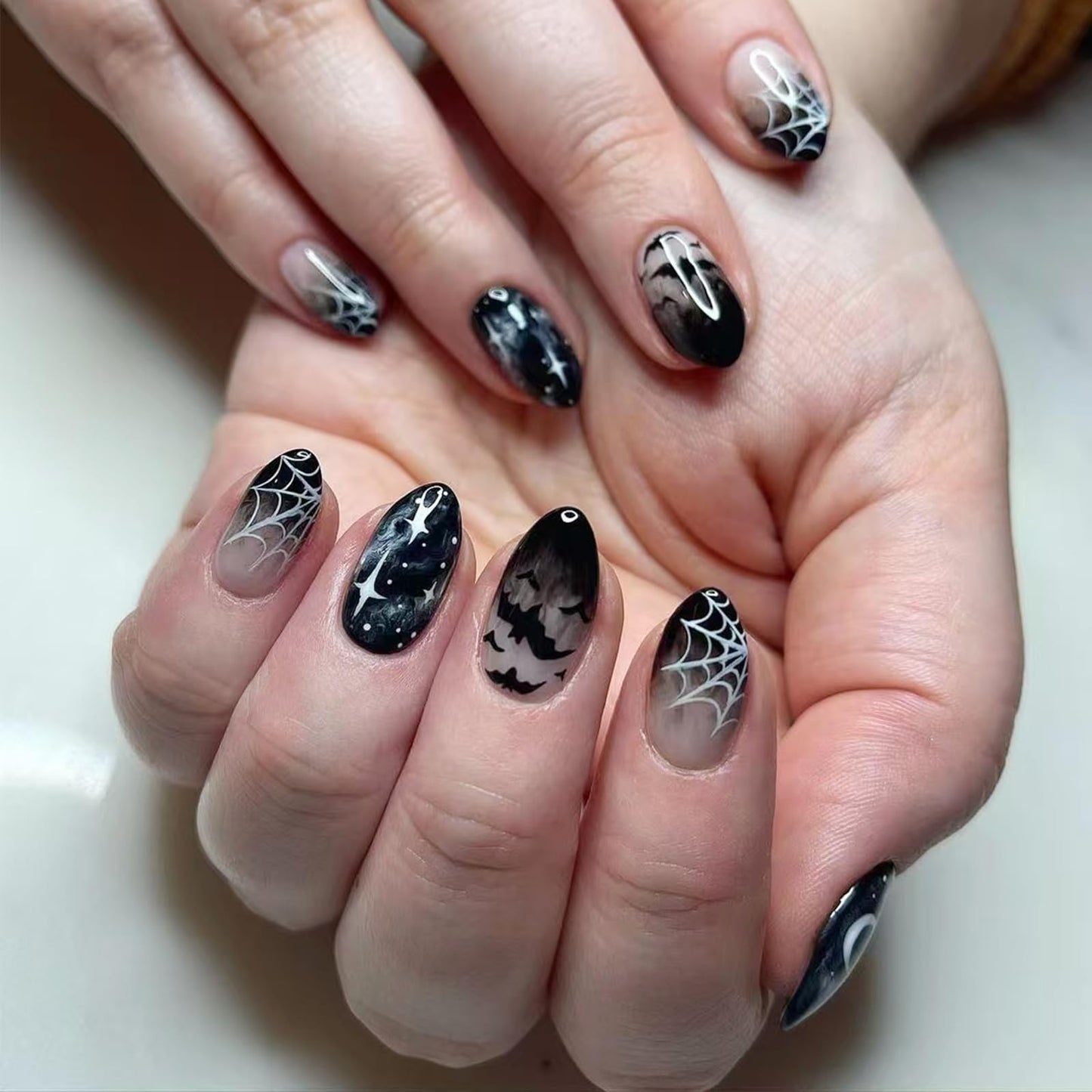24Pcs Halloween Black Bat Press on Nails Medium Almond False Nails with White Spider Web Star Designs Halloween Glue on Nails Gothic Fake Nails Full Cover Glossy Stick on Nail for Women DIY Manicure