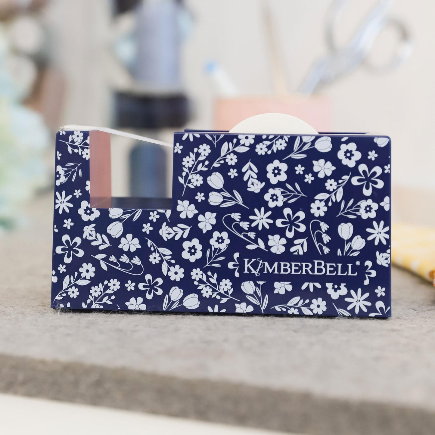 Kimberbell Navy Floral Tape Dispenser – Designed for Kimberbell Paper Tape – Stylish Floral Dispenser for Sewing and Machine Embroidery Projects – 5.375" x 3.25" x 2.25"