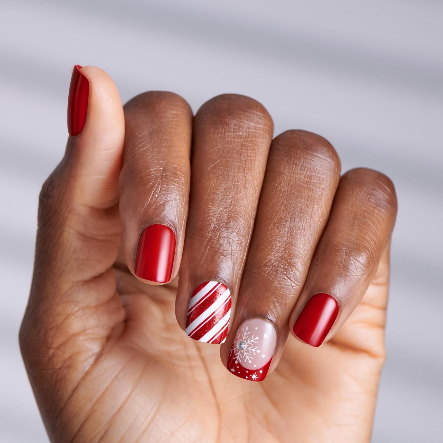 KISS imPRESS Holiday Press On Nails, ‘Santa Baby’, Red, Short Squoval, Improved Super Hold Adhesive, 30 Fake Nails, Prep Pad, Mini Nail File, & Manicure Stick