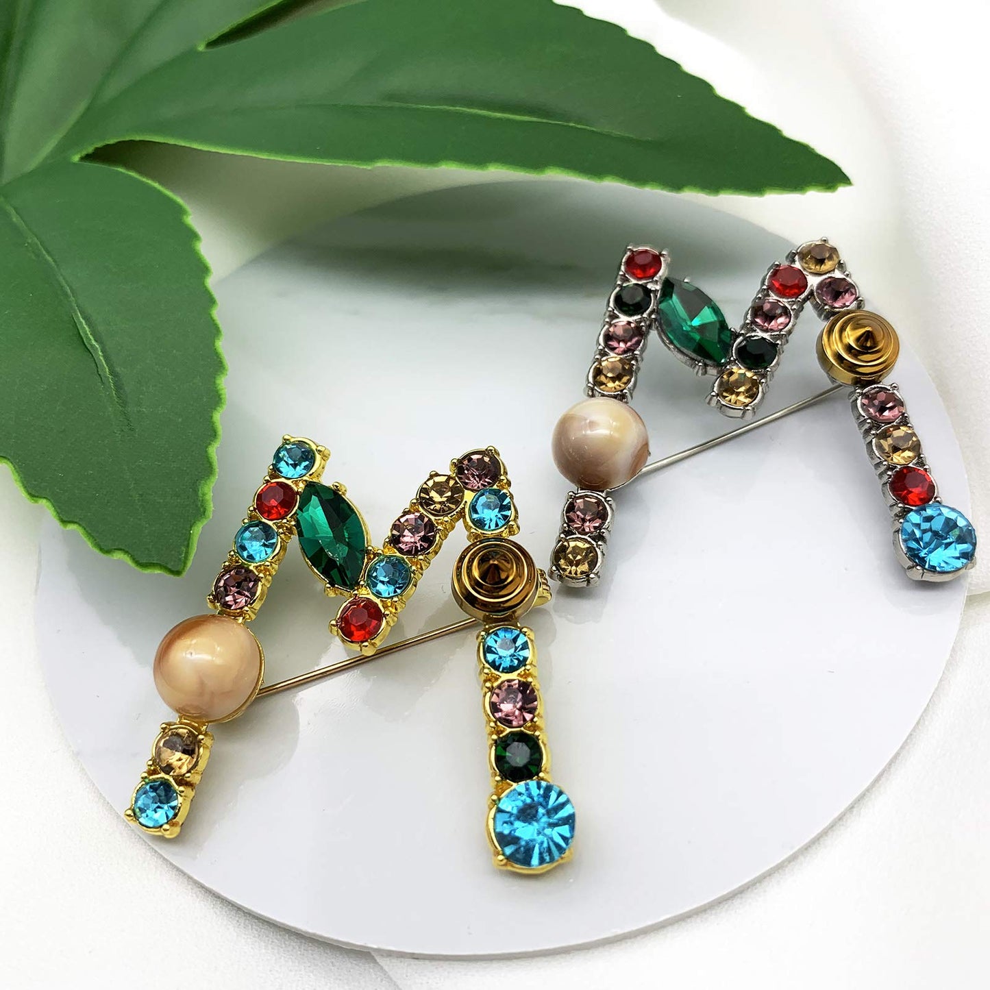 XGALBLA Letters M Plated Metal Stone Clear Colorful Crystal Lapel Pin Brooches Collar(Gold Tone)