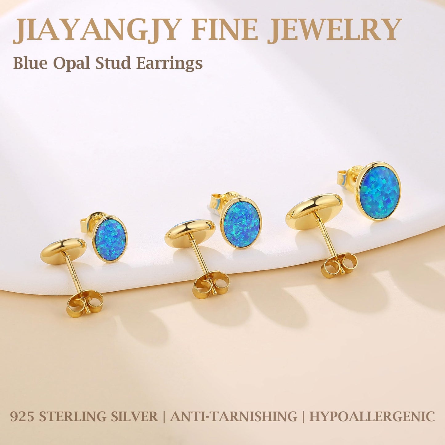 JiayangJY Silver Blue Fire Opal Stud Earrings for Women 18K Yellow Gold Plated Sterling Silver Oval Shape 6mm Opal Earrings with Push Back