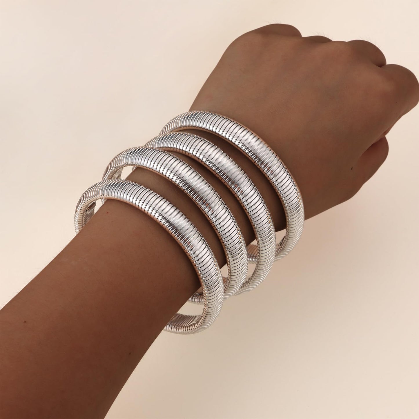 Giovanchi 18K Gold Plated Bangles for Women Set of 4 Chunky Stretch Bangles Bracelets Stainless Steel Bracelets Flexible Wide Stack Bracelets for Women
