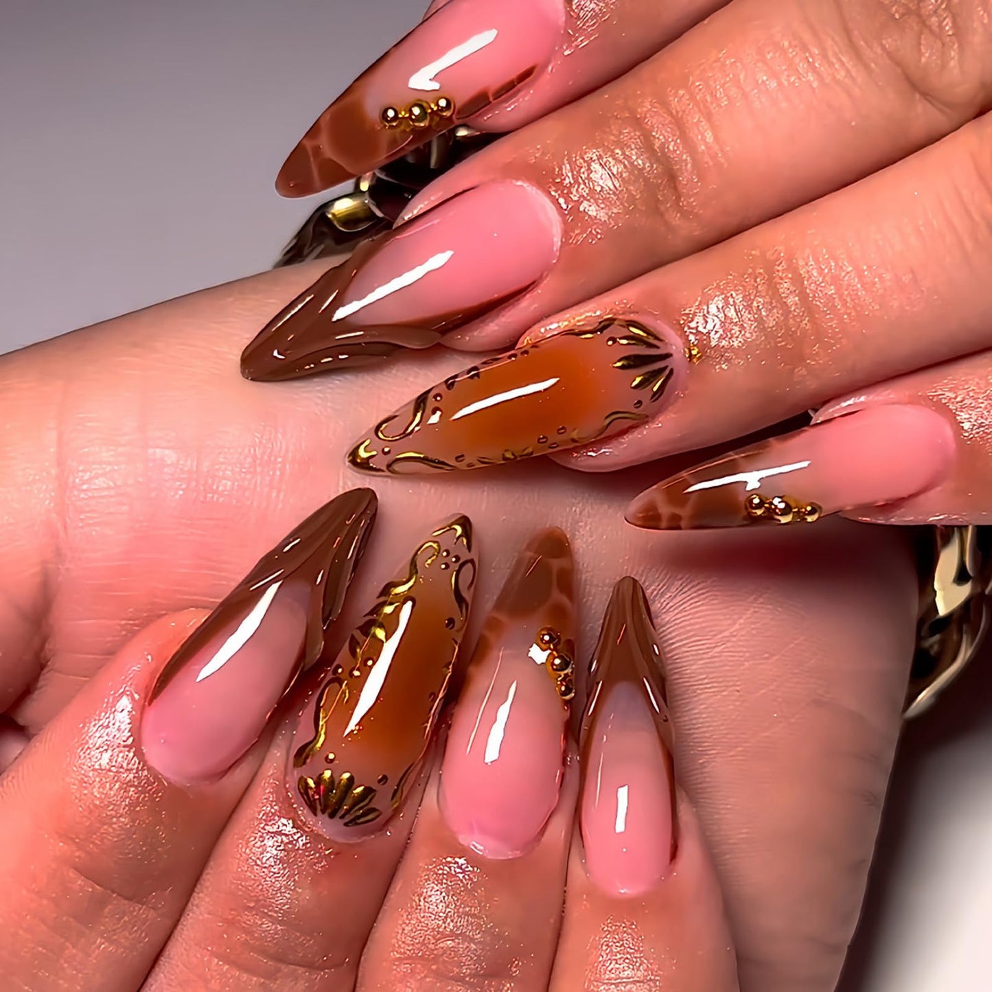IMSOHOT Press on Nails Long Stiletto Fake Nails Brown Crocodile Print French Tips False Nails with 3D Chrome Gold Pattern Designs Glossy Acrylic Handmade Glue on Nails 24Pcs