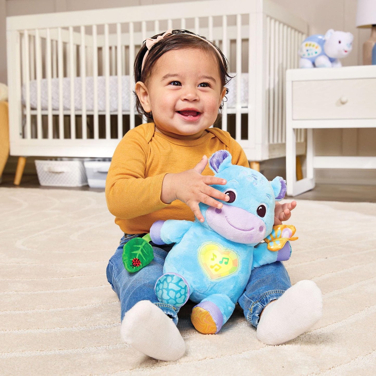 VTech Baby Hug-a-Hippo Musical Plush Toy with Lights and Textures, Blue