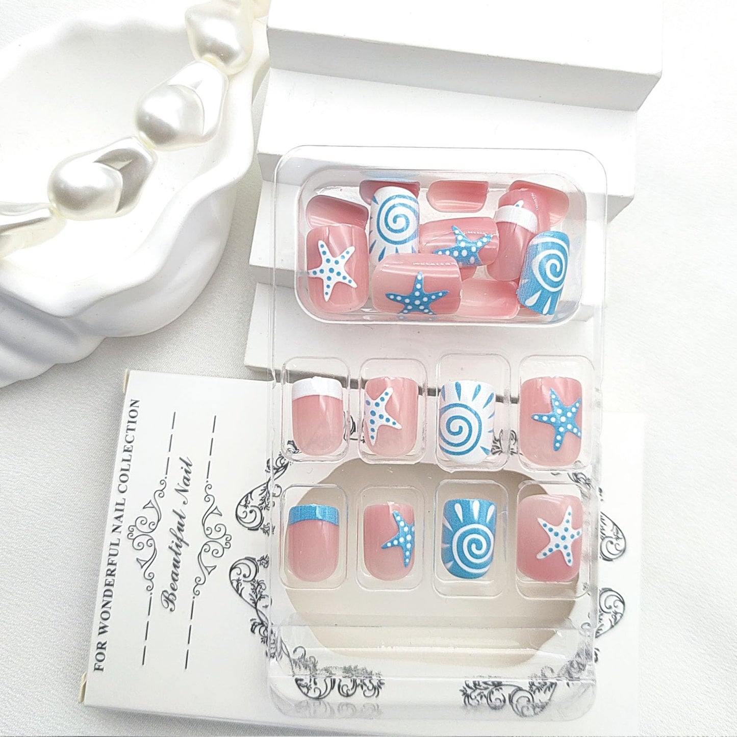 French Tip Press on Nails Short Square Fake Nails with Starfish White Swirl Designs Nails Press ons Blue Glue on Nails Cute Acrylic Nails Summer Stick on Nails for Women 24Pcs