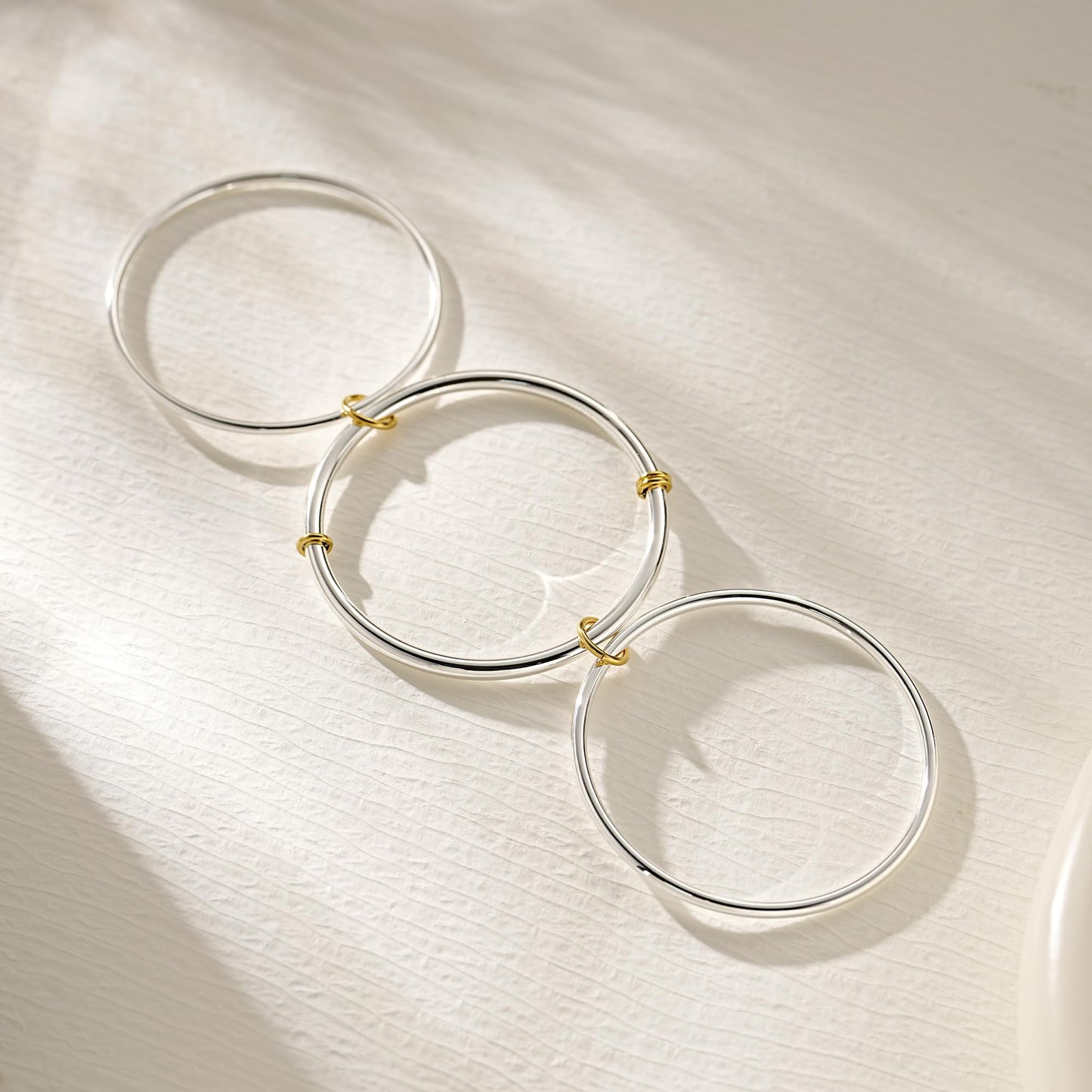 NOKMIT Two-Tone Stackable Bangle for Women High Polished Thin Interlocking Stainless Steel Bracelets Classic Plain Non-Tarnish Gold&Silver Mixed Metal 1PC/3PCS (3pcs, 7.5inch)