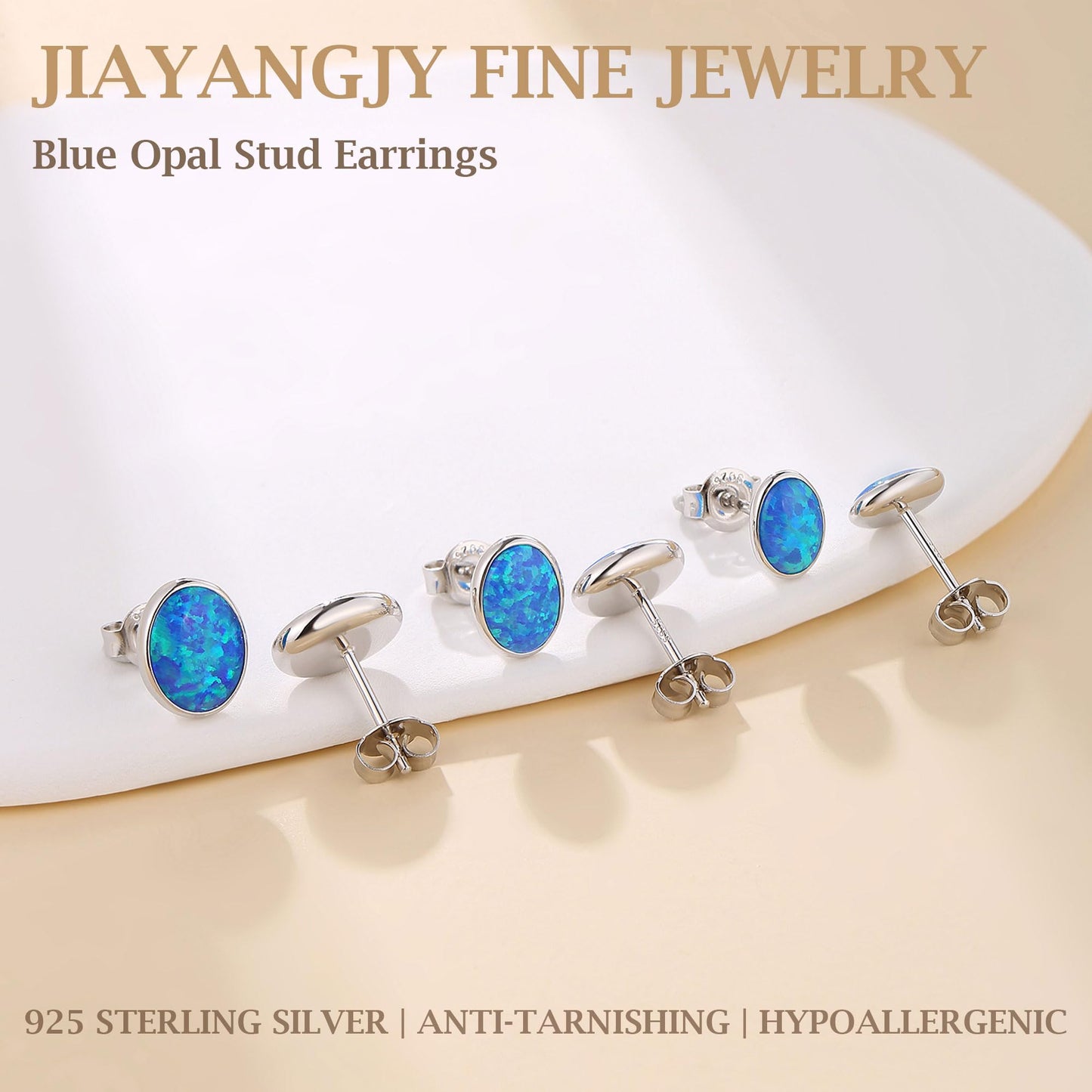 JiayangJY Silver Blue Fire Opal Stud Earrings for Women 18K White Gold Plated Sterling Silver Oval Shape 7mm Opal Earrings with Push Back