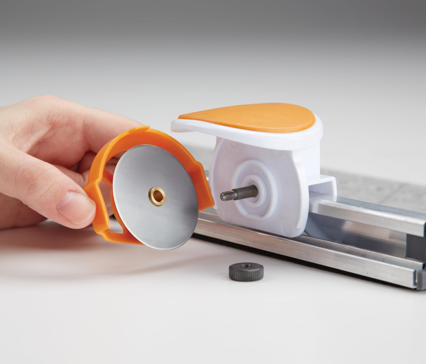 Fiskars Rotary Cutter and Ruler, Quilting Ruler, Rotary Cutter for Fabric, Built-In Measuring Grid & Spring-Action Blade, 24” x 6”, Gray/Clear