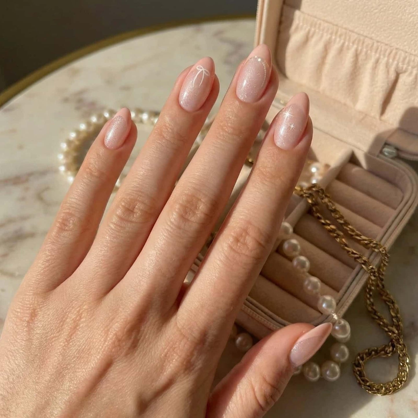 French Press on Nails Short Almond Fake Nails Pink with Bow Starlight Designs Full Cover Acrylic Glue on Nails Removable Artificial Stick on Nails for Women 24 Pcs