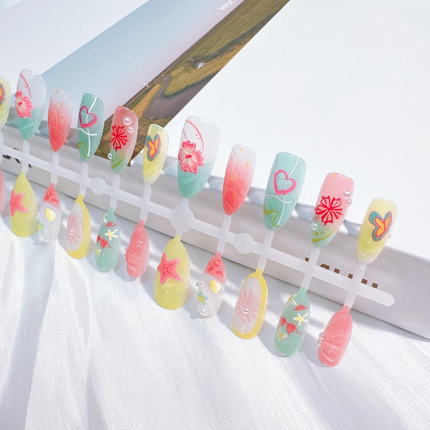 NZRAESTRS 30Pcs Summer Press on Nails Medium Almond Fake Nails with 3D Starfish Designs, 30pcs Beach Press on Nails, 1pc Nail File, 24pcs Nail Jelly Stickers, 1pc Wooden Stick
