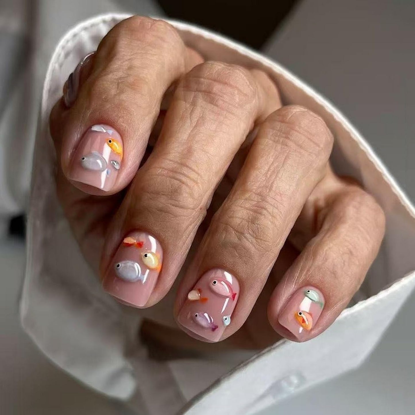 Fish Press on Nails Short Square Artificial Acrylic Fake Nail with Cute Colorful Fish Pattern Design Summer Stick on Nail Full Cover Reusable Press Ons Beach False Nails for Women 24Pcs