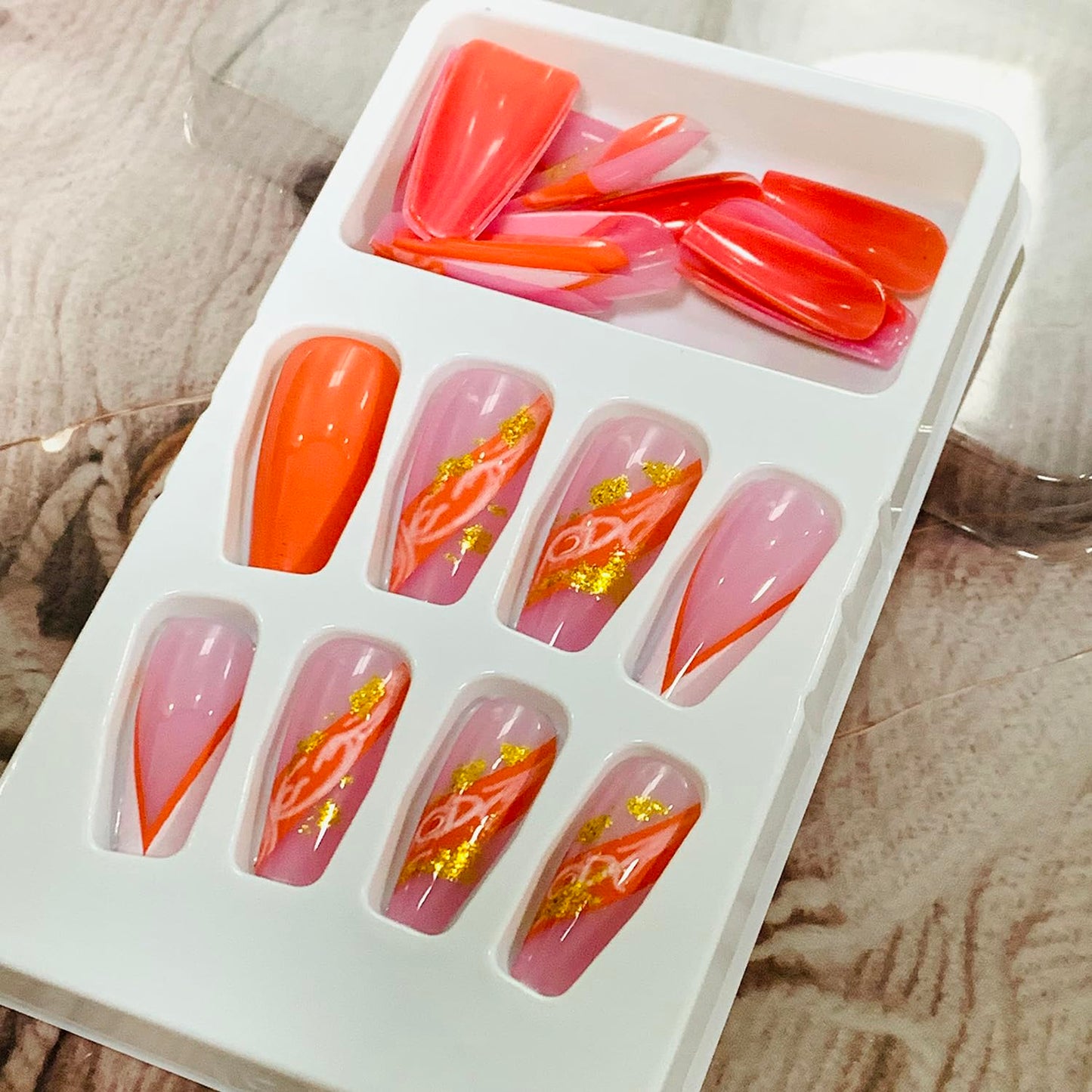Vezocim Orange Press on Nails Square 24Pcs Glossy Full Cover Medium Acrylic Square False Nails with Marble Designs Artificial Coffin Fake Nails Glue Stick ons Fingernails with Charm for Women