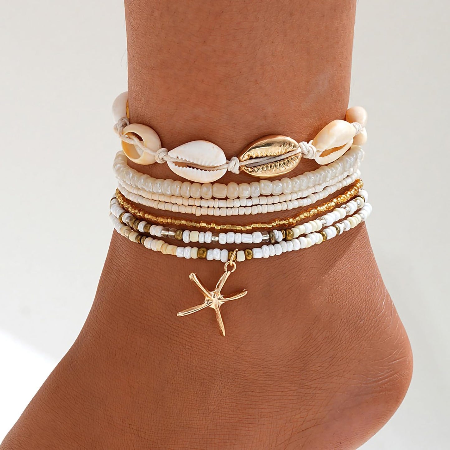 Qceasiy Shell Ankle Bracelet Set for Women, Gold Plated Boho Bead Adjustable Anklet, Hawaiian Beach Seashell Pearl Heart Starfish Conch Foot Jewelry Gifts (Starfish Shell 7Pcs)