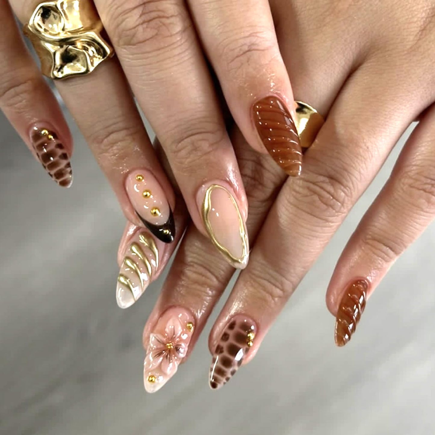 Mivota Brown Soft Gel Press On Nails 24PCS – Mixed Texture Almond Fake Nails with 3D Flower Design, Gold Edge & Snake Pattern, Glossy Reusable Glue On Nails for Women, Trendy Fall Nail Tips
