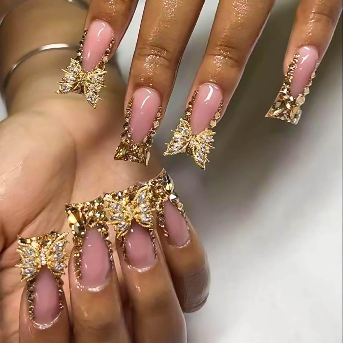 RUOKEXIN Long Press Duck False Nails Gold Glitter French Tip with Gold 3D Butterfly Designs - Glossy Artificial Nails, Cute Stick Ons for Women - 24Pcs