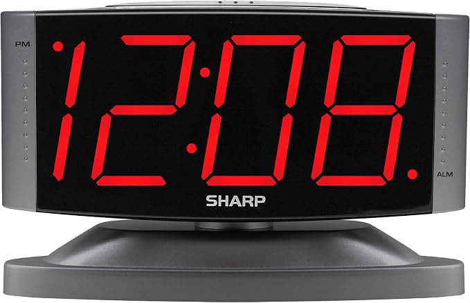 Sharp Outlet-Powered Alarm Clock with Swivel Base, Red LED, Gunmetal Grey | Large red LED digits; Adjustable swivel base; Brightness dimmer; Snooze alarm; Simple controls; Outlet powered