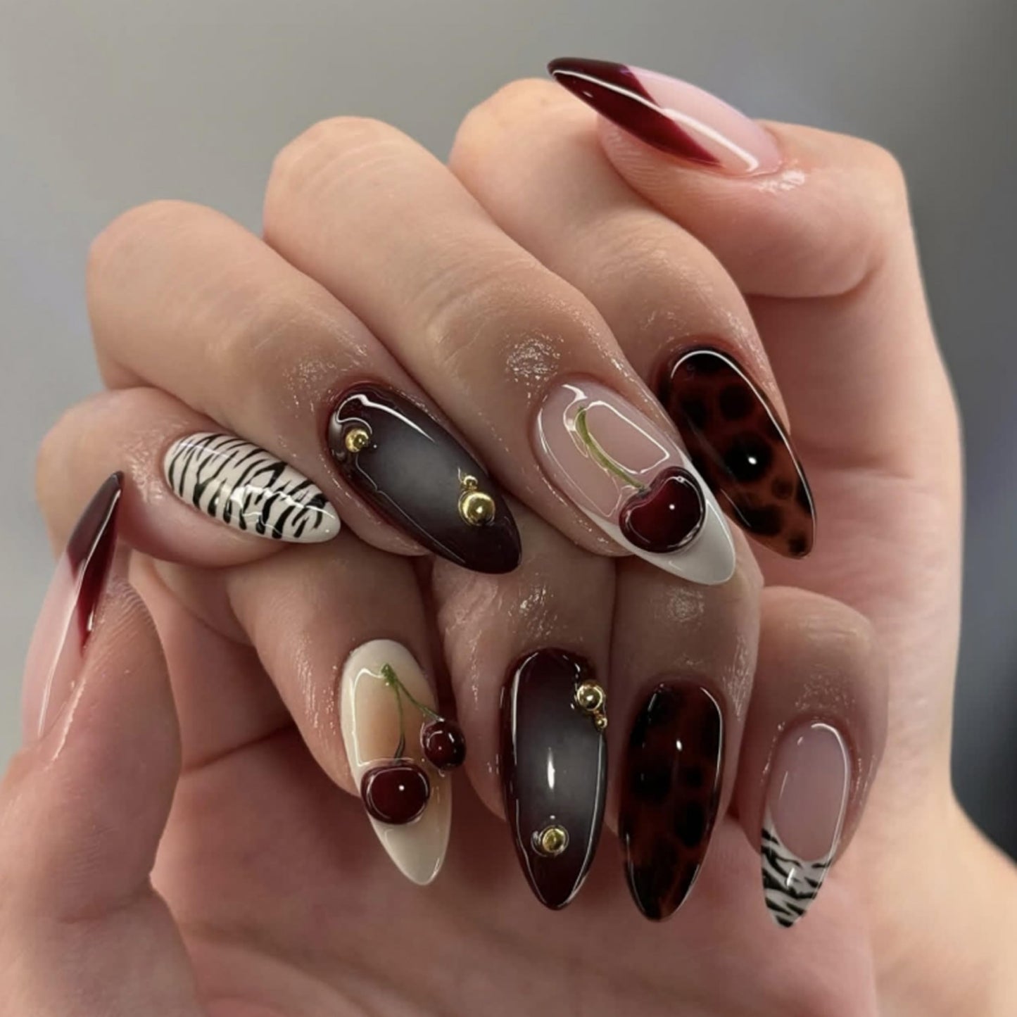 Almond Press on Nails Medium Fake Nails Brown Acrylic Nail Press ons Seeneey Cherry and Gold Charm Designs Tortoise Shell Stick on Nail for Women 24pcs