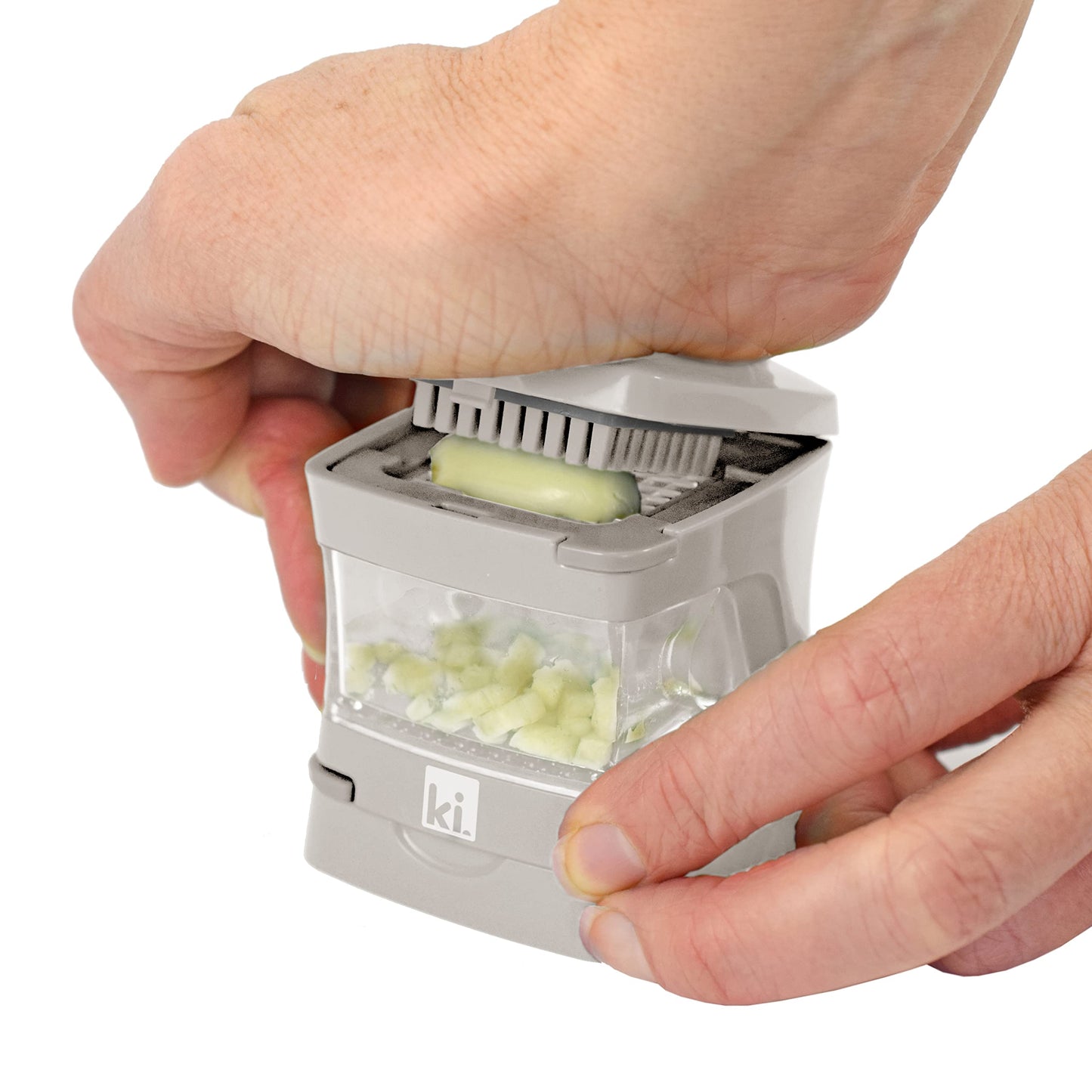 Kitchen Innovations Garlic-A-Peel Garlic Press, Crusher, Cutter, Mincer, and Storage Container - Includes Silicone Garlic Peeler - Easy to Clean - Stainless Steel Blades – (Cream), standard