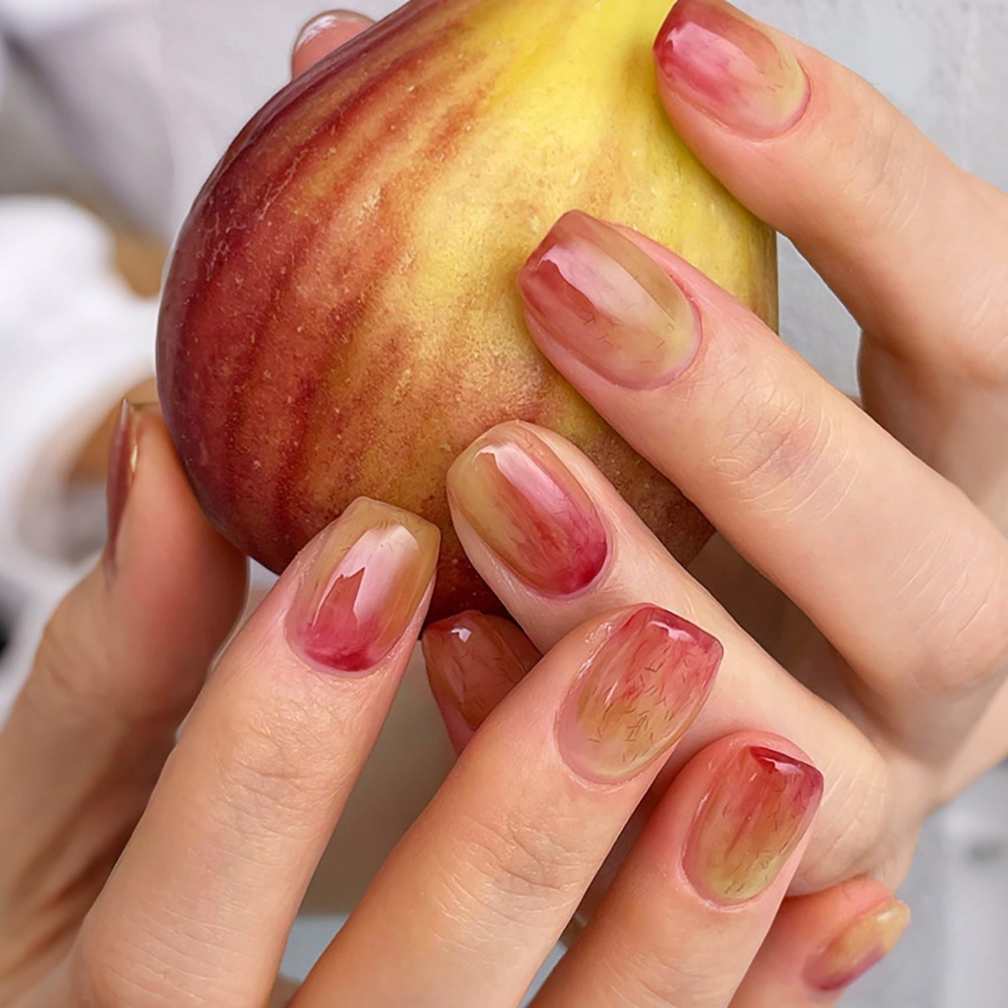 Rilafuvu Press on Nails Extra Short Square Fake Nails Spring Summer Peach Ombre Acrylic Nail with Designs Full Cover False Nails Glossy Nails Press Ons Short Stick on Nail for Women24Pcs