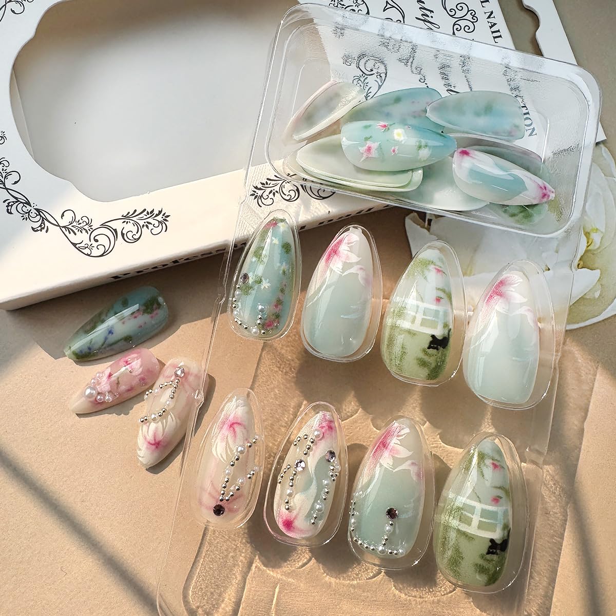 24Pcs Flower Press on Nails Medium Almond Lotus Leaf Fake Nails with Pearl Gems Bow Design Cute Cat False Nails Spring Summer Full Cover Artificial Glue on Nails Handmade Stick on Nails for Women DIY