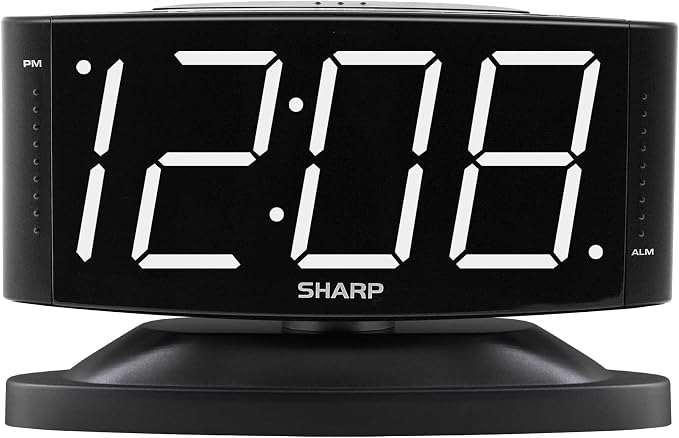 Sharp Digital Alarm Clock with Swivel Base, White LED, Dimmer, Black | Large white LED digits; Adjustable swivel base; Brightness dimmer; Snooze alarm; Simple controls; black case