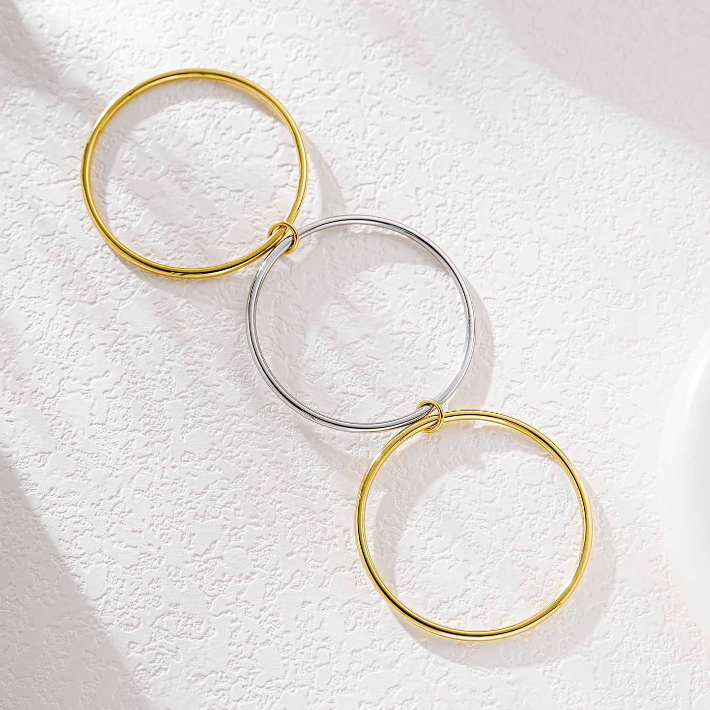 NOKMIT Triple Interlocked Stackable Bangle Bracelets for Women 3-Pack Two-Tone High Polished Stainless Steel Bangle Set Classic Plain Thin Non-Tarnish Gold&Silver (8.0 inch)