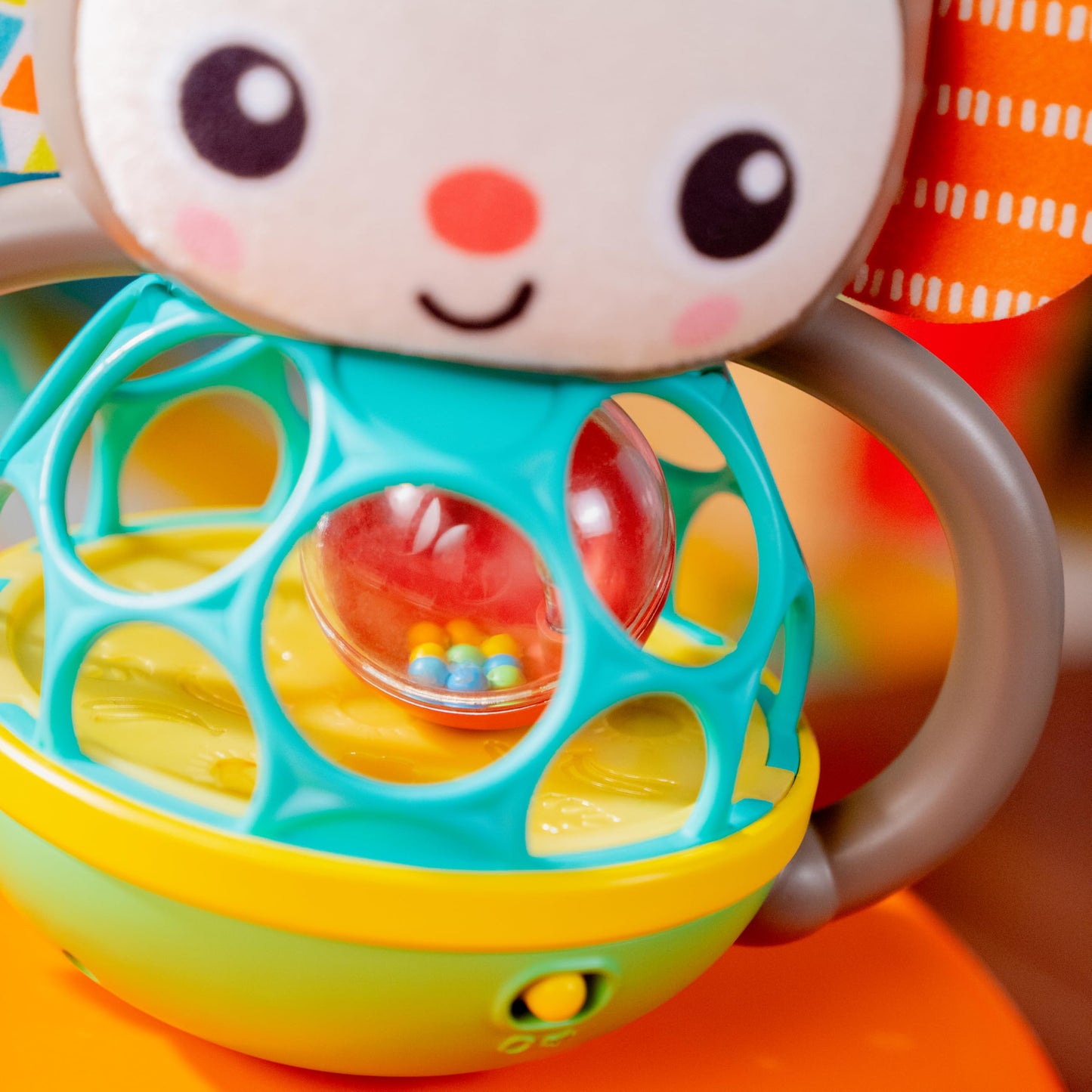 Bright Starts Grab & Giggle Monkey Light-Up Musical Rattle Toy with Easy-Grasp Oball, Ages 6 Months+, Unisex