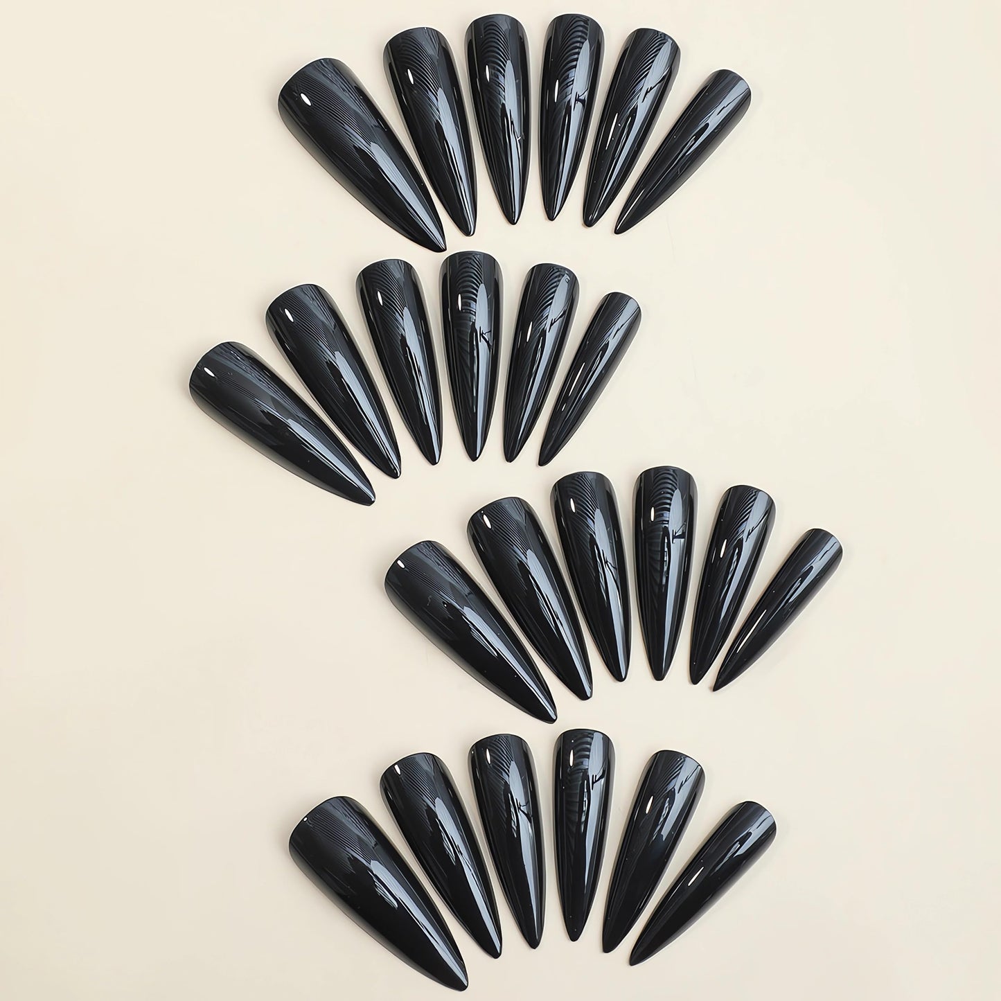 IMSOHOT Stiletto Press on Nails Extra Long Fake Nails All Black Glossy False Nails with Designs Full Cover Solid Color Acrylic Almond Glue on Nails for Women 24Pcs