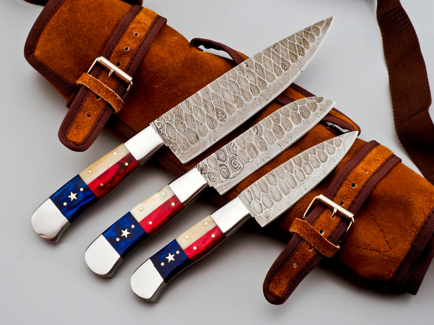 Professional Damascus Chef Knife Set 3 Pcs Custom Handmade Set with Leather Roll - Kitchen Cutlery Set for Home Cooks & Chefs - Ergonomic Texas Flag Handles - Includes Storage Roll (9019)