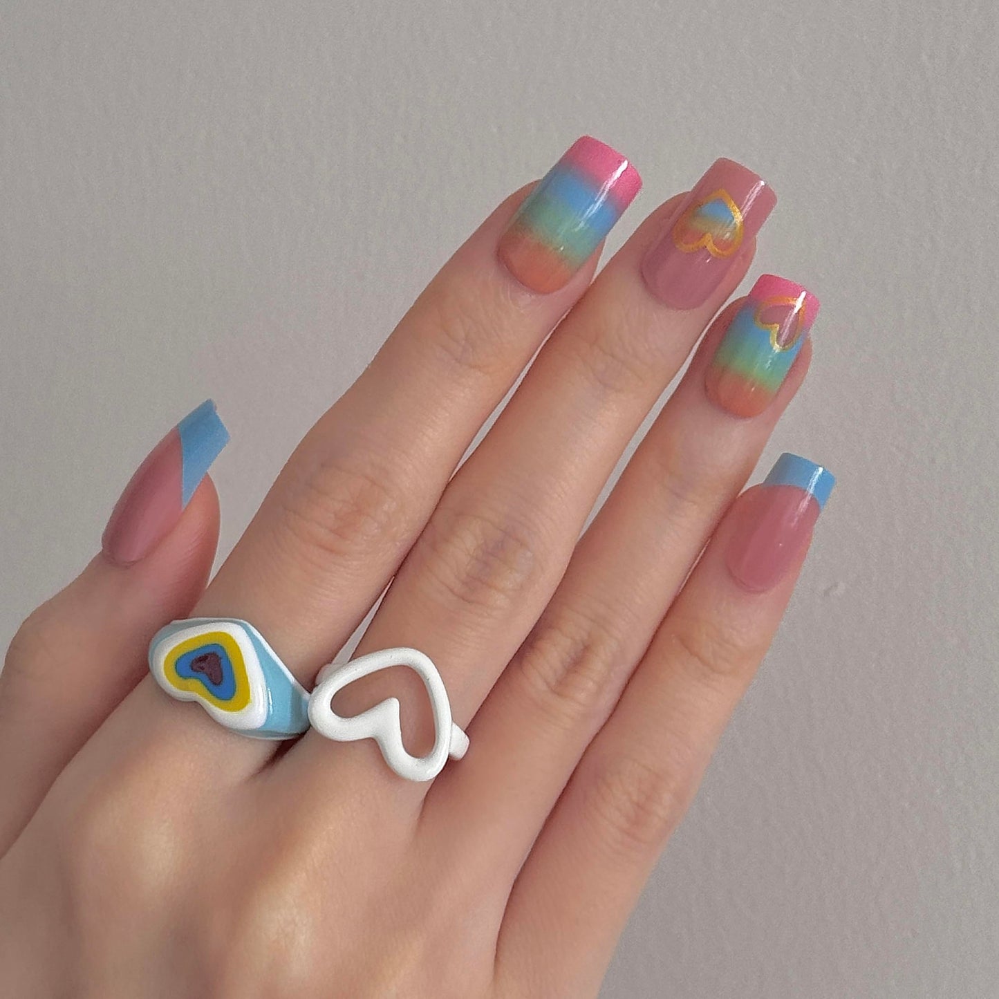 24 Pcs Rainbow Coffin Press on Nails - Colorful French Tip Acrylic Nails with Hollow Heart Design