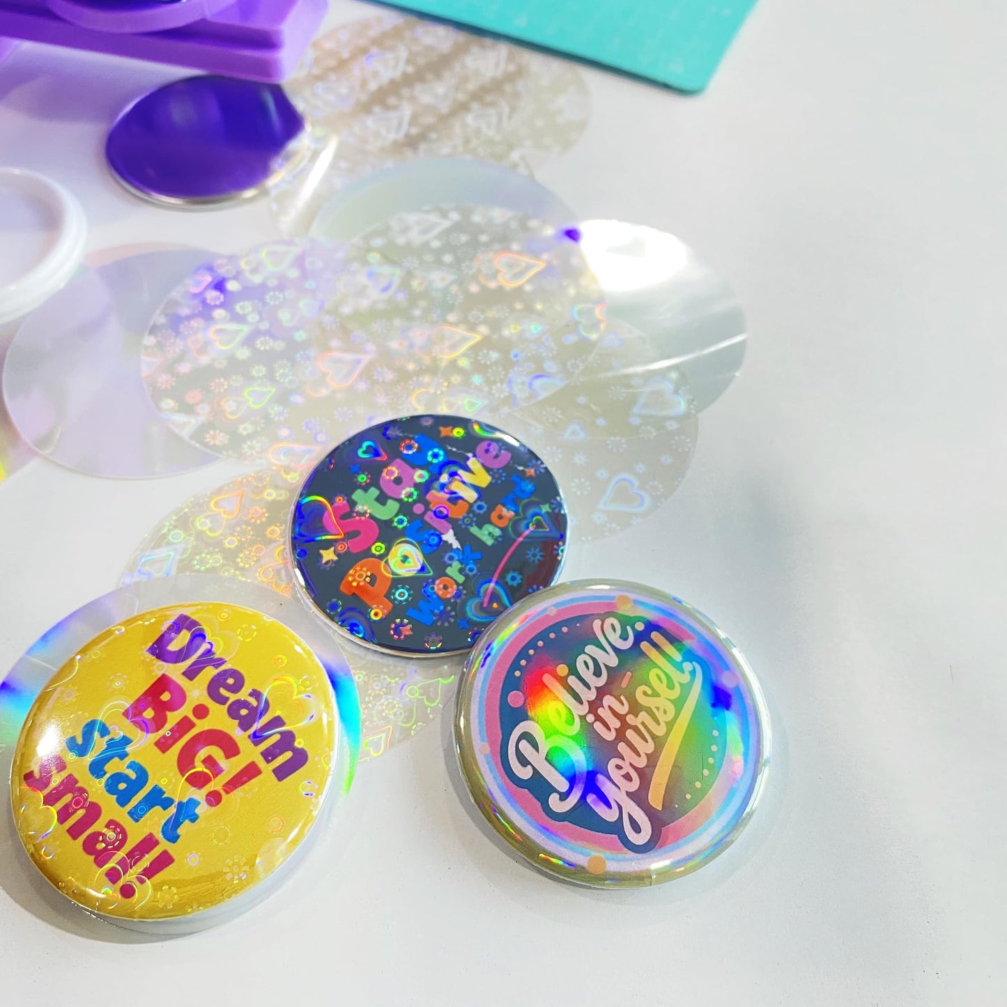 Button Maker Machine 2.25'' Button Press Machine Pin Badge Maker Machine with 100 Set Holographic Film, Button Pinback Making Supplies, Removable Dies, 1 Circle Cutter, 1 Cutting Mat, 50 Photo Paper