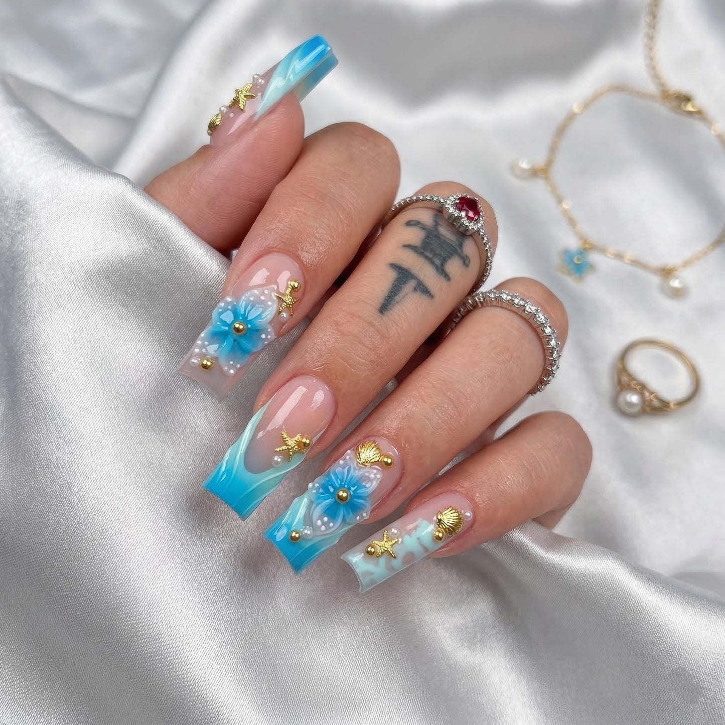 Long Press on Nails Square Fake Nails Blue Acrylic Nail Press ons Seeneey 3D Flowers and Gold Charm Designs Cute Sparkly Beach Stick on Nail for Women 24pcs
