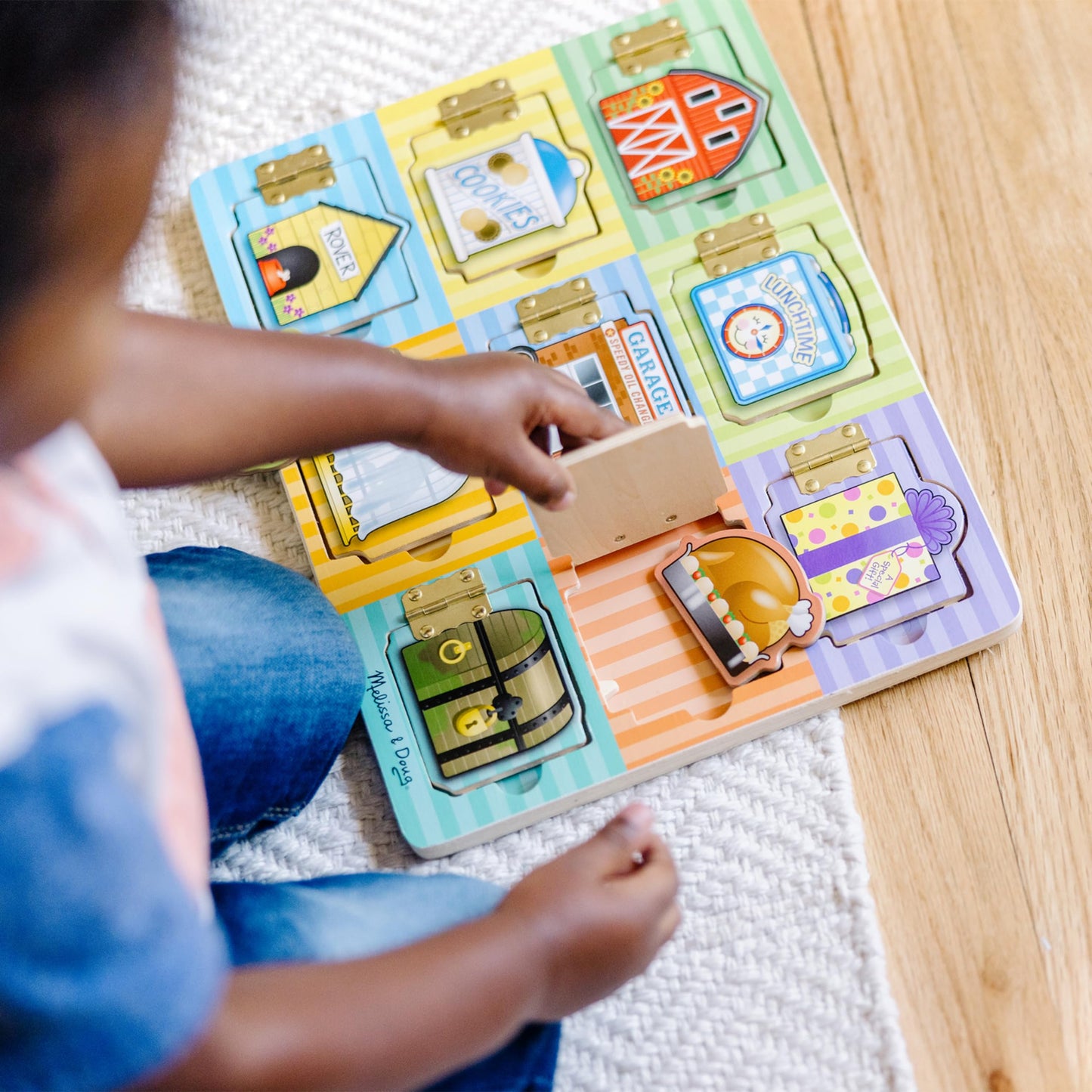 Melissa & Doug Wooden Hide & Seek Activity Board – Montessori Busy Board with Hinges, Doors & 9 Wooden Magnetic Puzzles, Educational Preschool Learning Toy for Toddlers & Kids Ages 3+