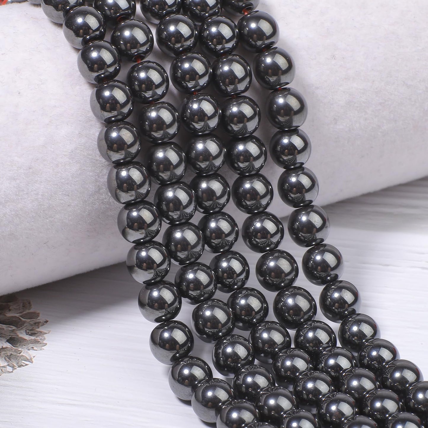 NITOPUPU 100Pcs 8mm Natural Smooth Black Hematite Beads Round Loose Stone Beads for Jewerly Making with Crystal Stretch Cord