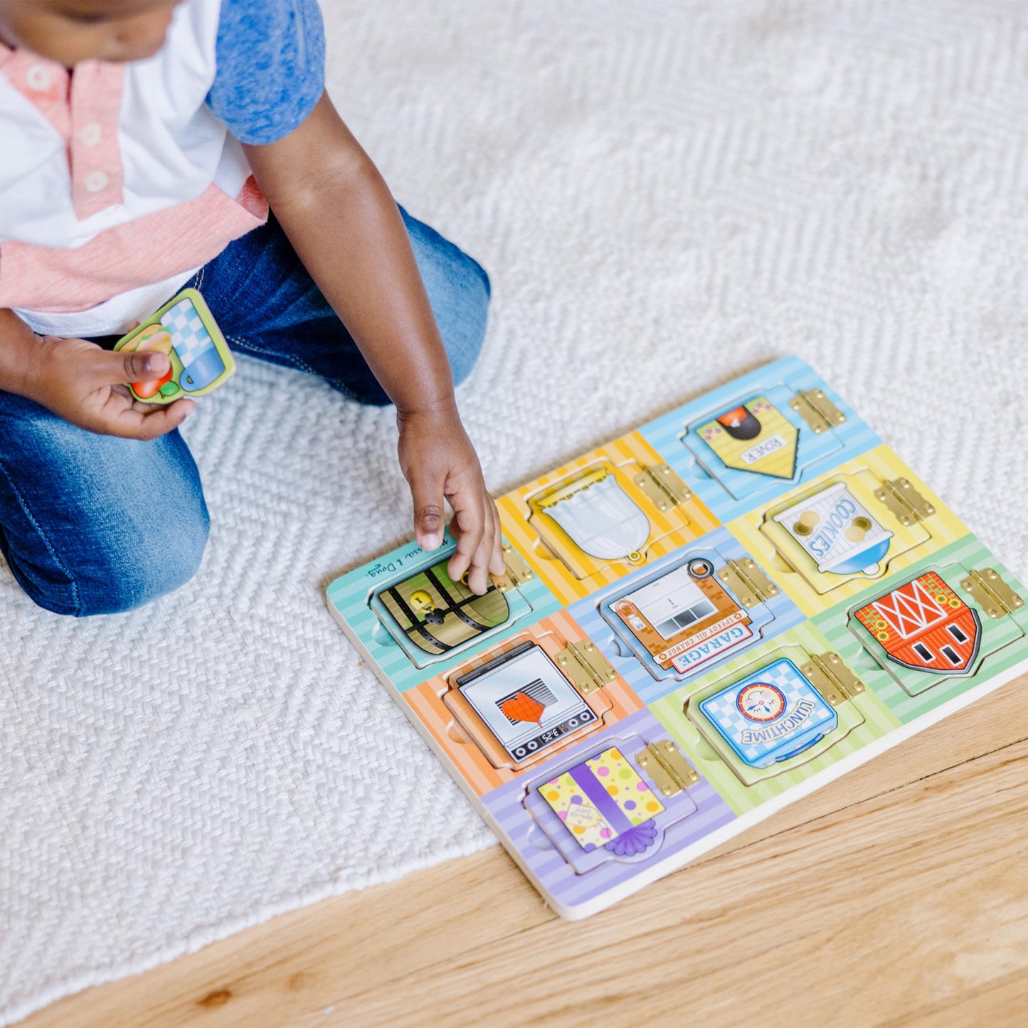 Melissa & Doug Wooden Hide & Seek Activity Board – Montessori Busy Board with Hinges, Doors & 9 Wooden Magnetic Puzzles, Educational Preschool Learning Toy for Toddlers & Kids Ages 3+