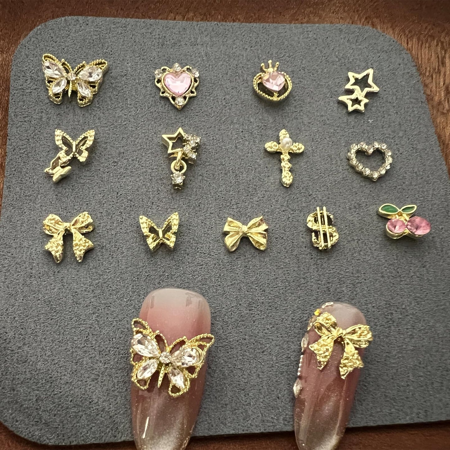 100 Pcs 3D Gold Nail Charms with Cherry Butterfly Cross Bow Star Heart Dollar for Women Nail Art DIY Design